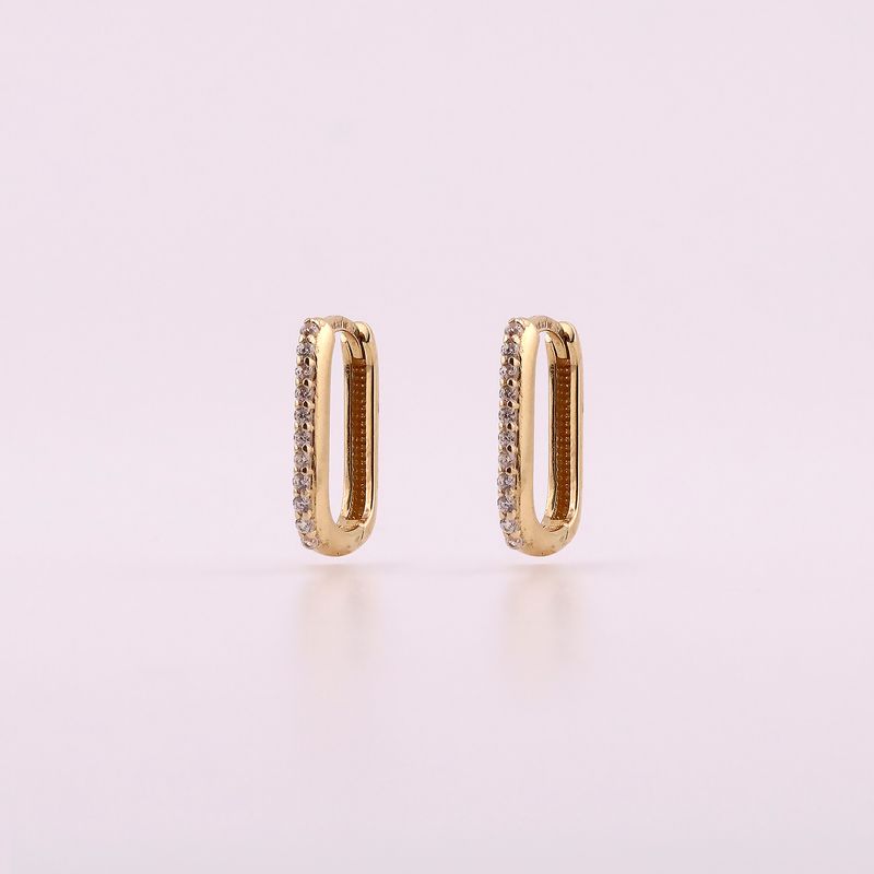 Huggie Ovalo Con Piedra Blanca 14k 1.7g