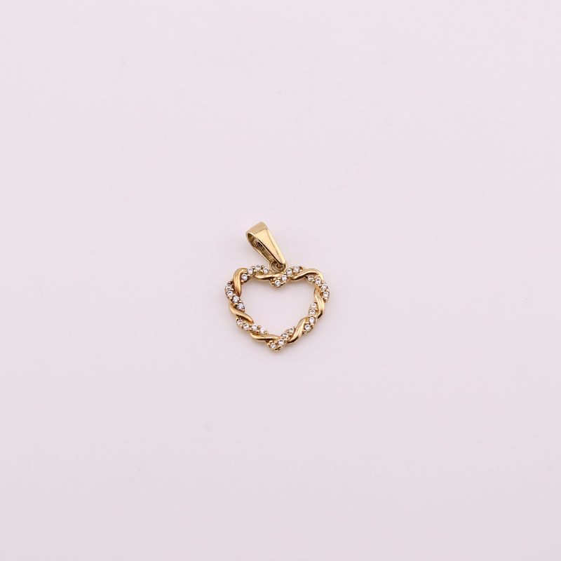 Dije Corazon Torcido 10k 0.9g