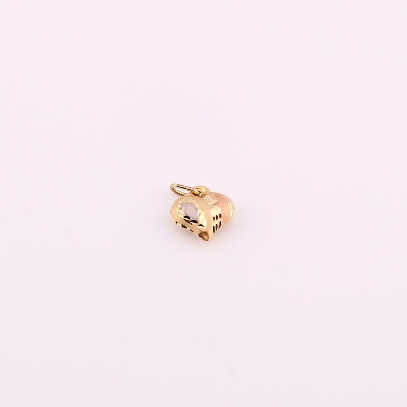 Dije Corazon Relim.  14k 0.5g