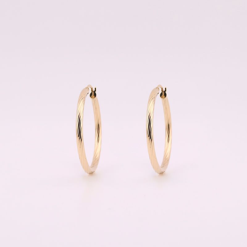 Arracadas Grabadas Torcidas 14k 2.1g