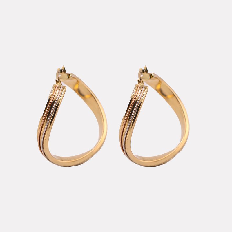 Arracadas Torcidas Satin. 14k 3.4g