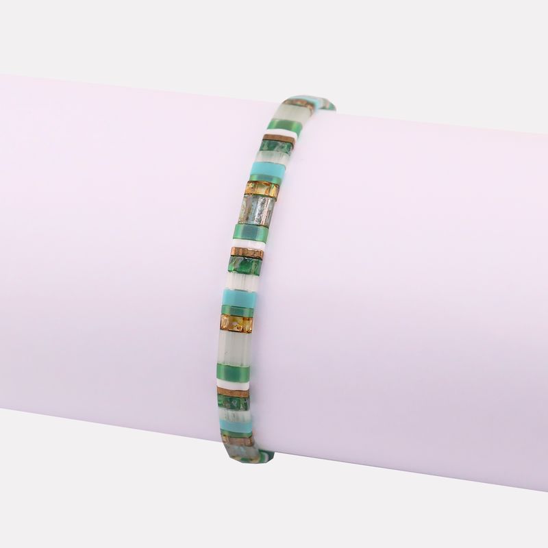 Pulsera Esme. Mosaico Bco/cafe/azul 14-17cm